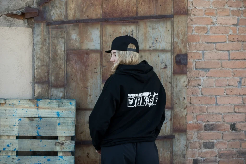Dancer wearing Weehawken Dance logo clothing