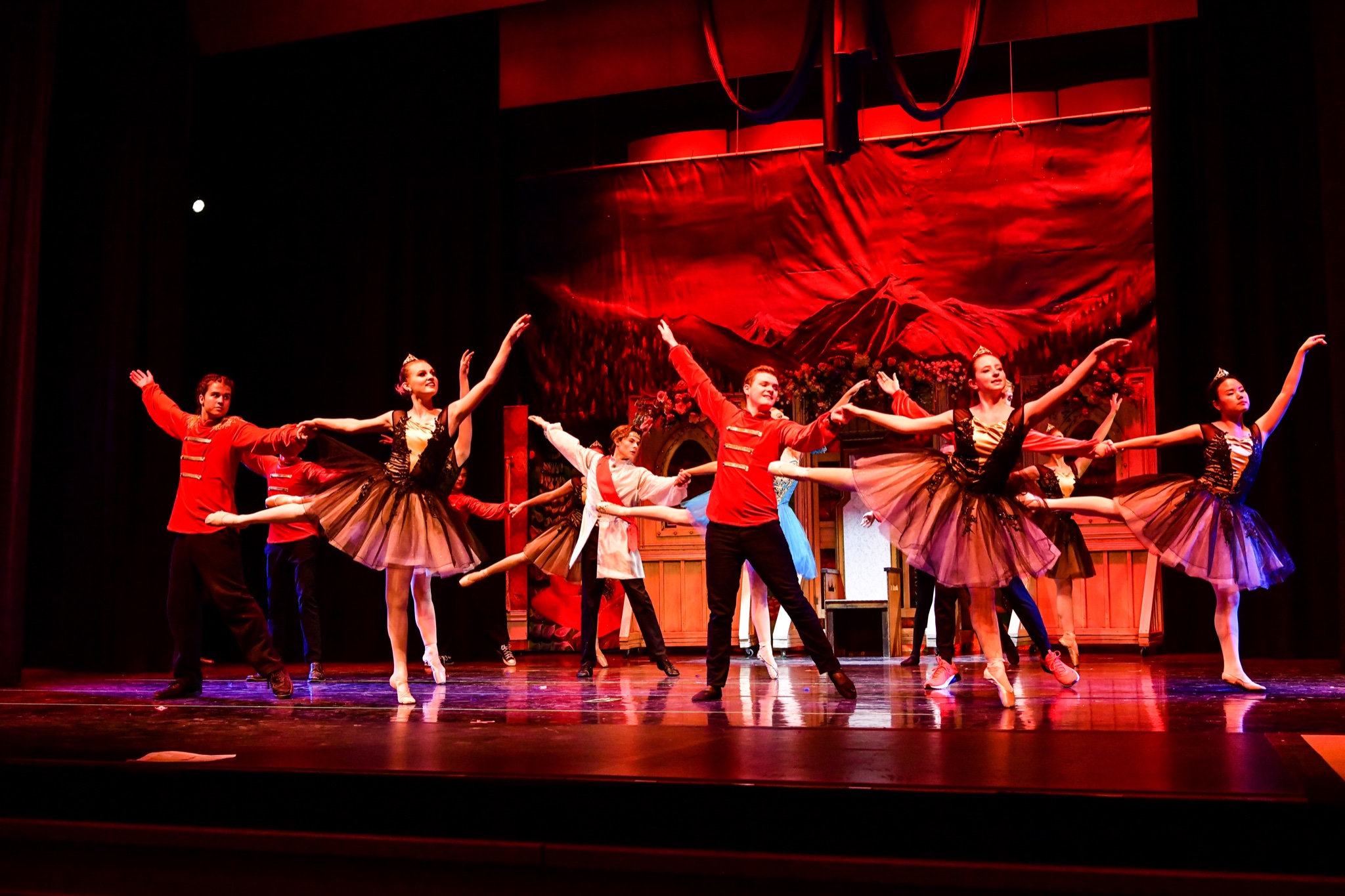 Dancers on stage posed