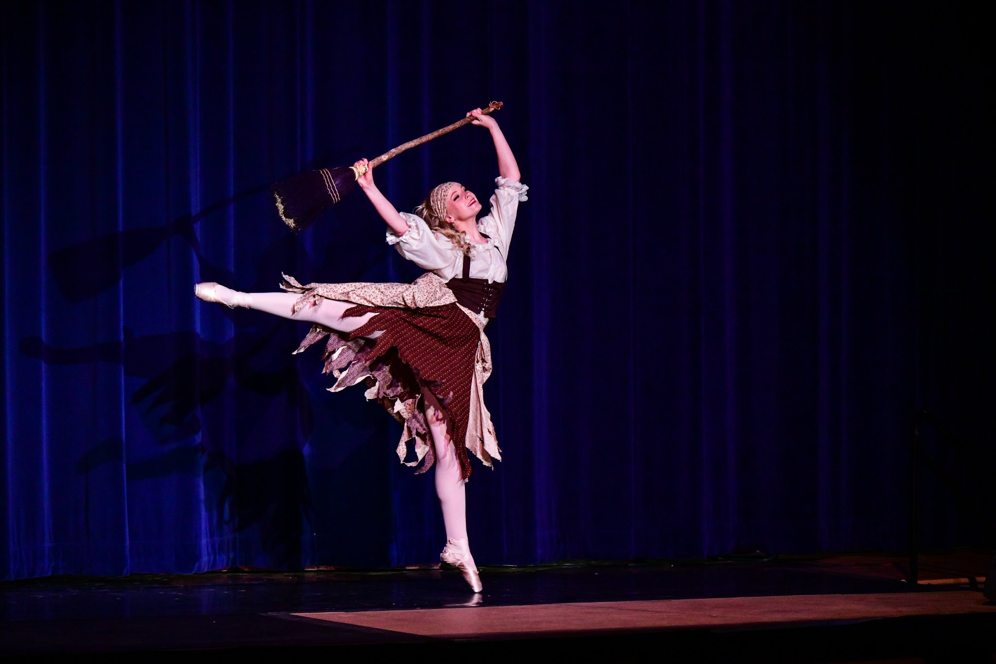 cinderella ballerina dancing with broom