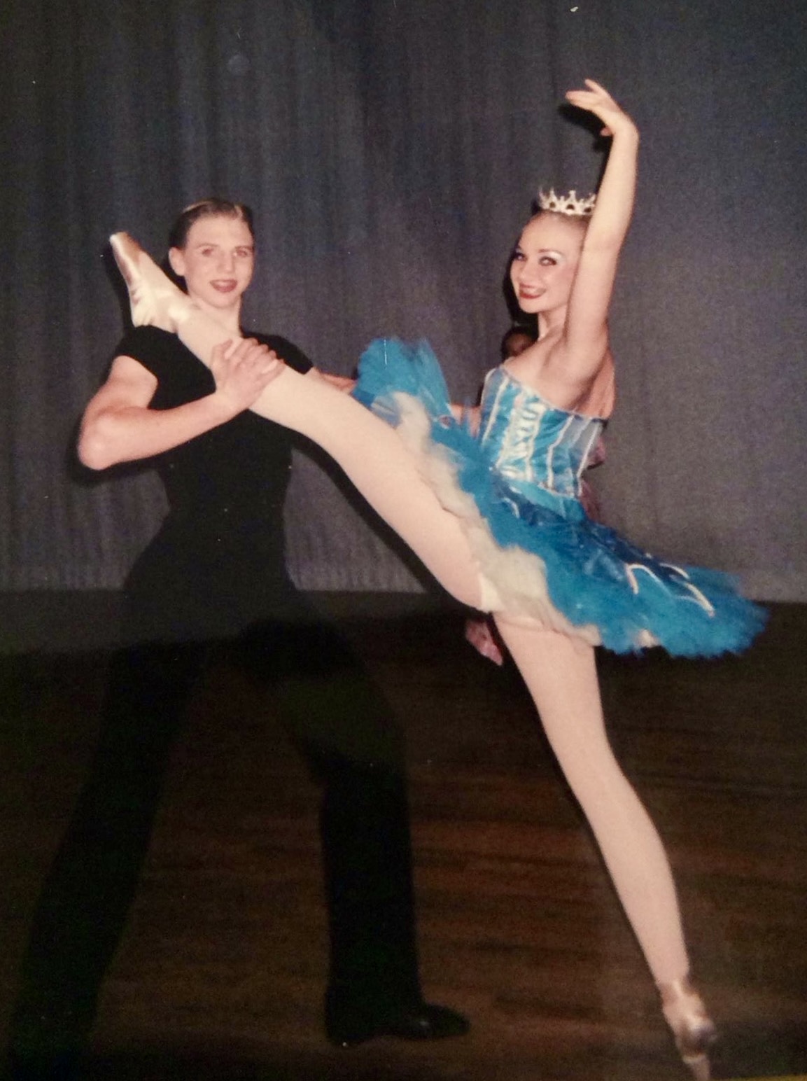 2 dancers stretching
